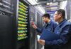 140 bilionów tokenów dziennie. Chiny mierzą nowy etap gospodarki AI AI w Chinach: pracownicy w centrum obliczeniowym China Mobile w Qingyang w prowincji Gansu.